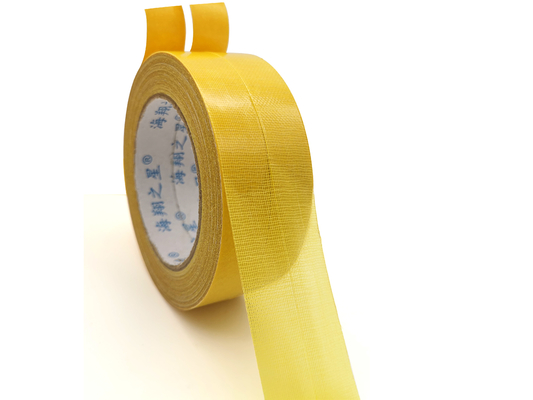 Cinta adaptable adhesiva echada a un lado doble amarillo de la alfombra del derretimiento caliente